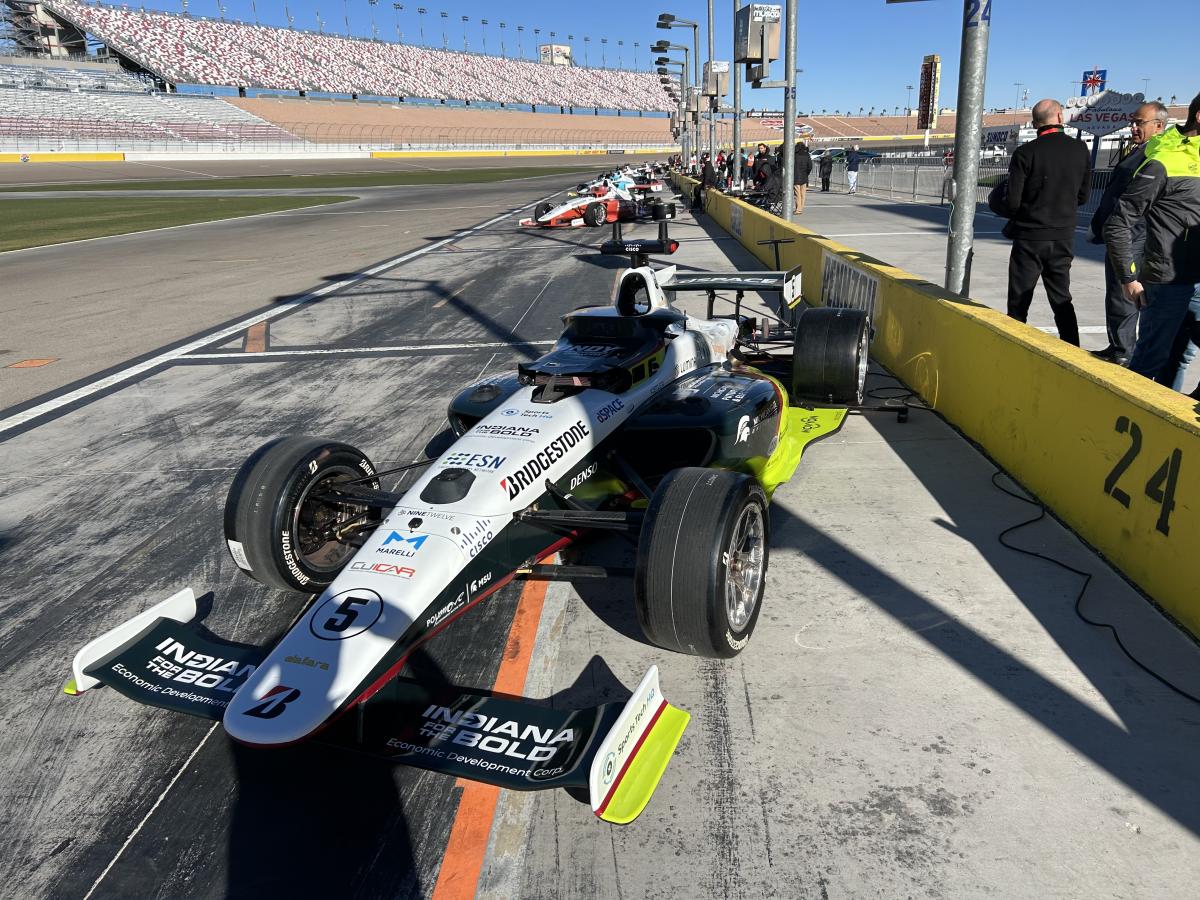 Racecar in the pit at a racetrack