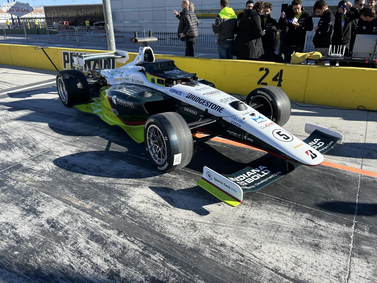Racecar in the pit at a racetrack